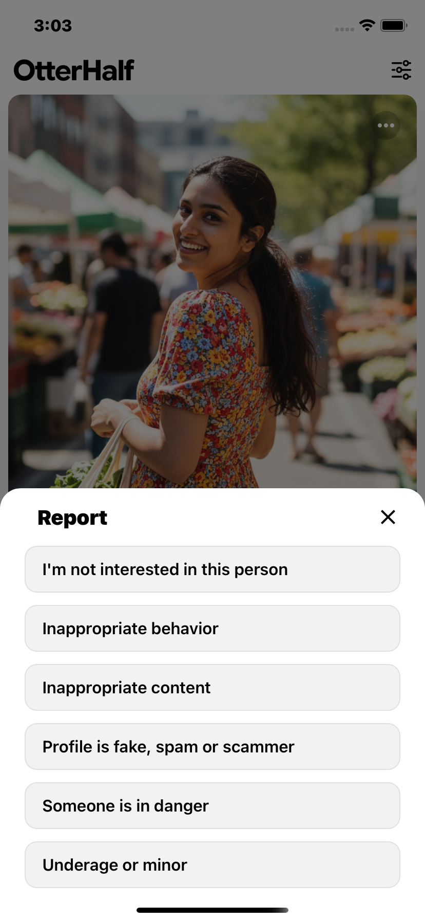 OtterHalf Report modal with reason options: I'm not interested, Inappropriate behavior, Inappropriate content, Profile is fake or scammer, Someone is in danger, Underage or minor.